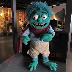 Cyan Frankenstein'S Monster mascot costume character dressed with a Corduroy Pants and Scarves