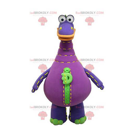 Mascotte de dinosaure violet et vert. Dinosaure géant -