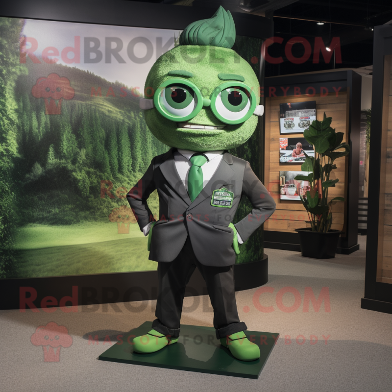 Forest Green Cyclops mascot costume character dressed with a Suit and Ties