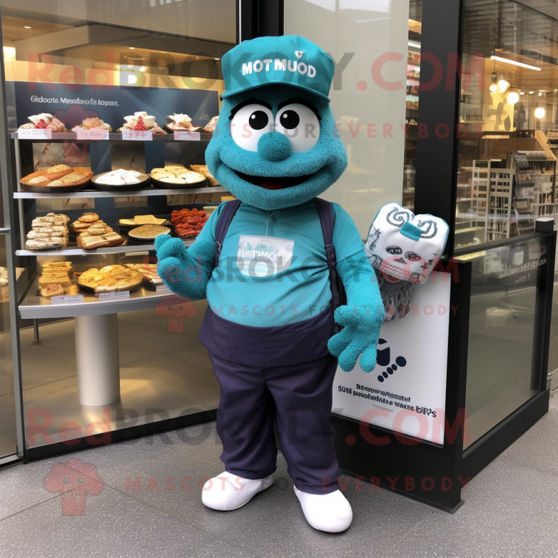 Teal Cupcake mascot costume character dressed with a Oxford Shirt and Wallets