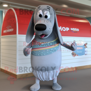 Silver Hot Dogs mascot costume character dressed with a Swimwear and Shawl pins