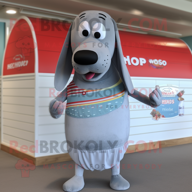 Silver Hot Dogs mascot costume character dressed with a Swimwear and Shawl pins Silver Hot Dogs mascot costume character dressed with a Swimwear and Shawl pins