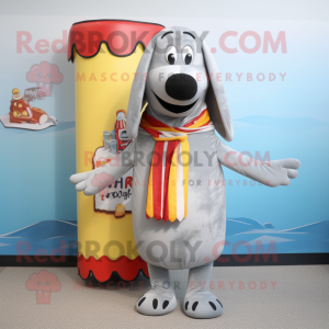 Silver Hot Dogs mascot costume character dressed with a Swimwear and Shawl pins