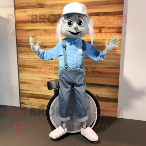Silver Unicyclist mascot costume character dressed with a Chambray Shirt and Shoe clips