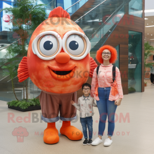 Peach Clown Fish mascot costume character dressed with a Mom Jeans and Eyeglasses