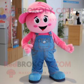 Pink Candy mascot costume character dressed with a Denim Shirt and Caps