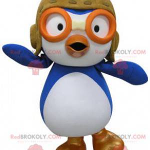 Mascotte d'oiseau bleu et blanc en tenue d'aviateur -