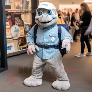 Gray Sea Turtle mascot costume character dressed with a Oxford Shirt and Messenger bags