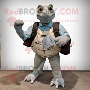 Gray Sea Turtle mascot costume character dressed with a Oxford Shirt and Messenger bags