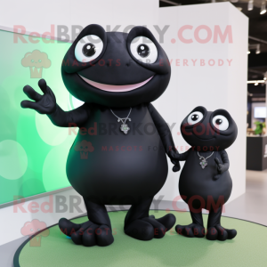 Black Frog mascot costume character dressed with a Maxi Dress and Smartwatches