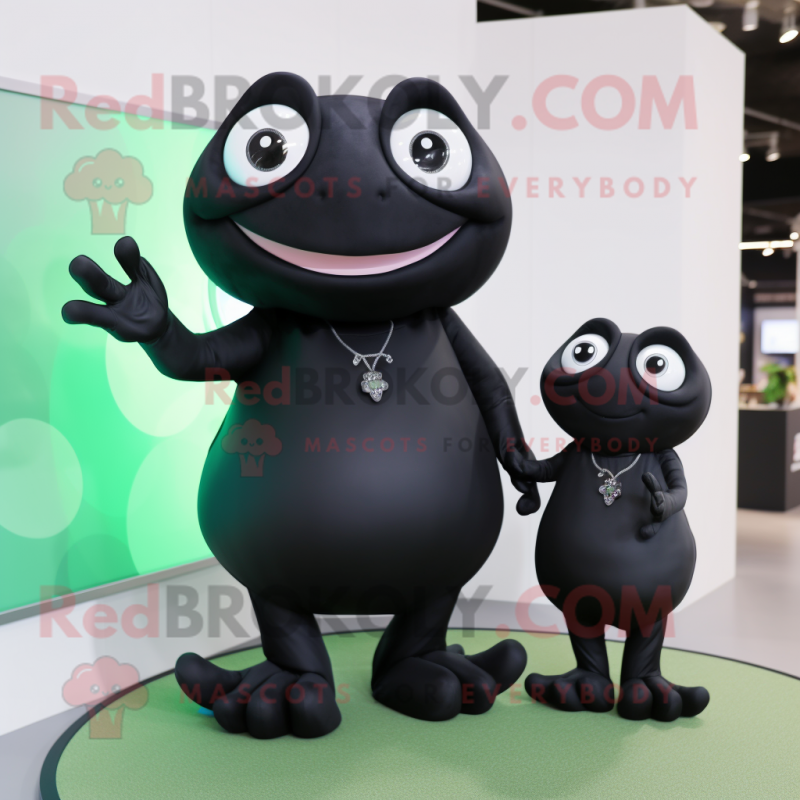 Black Frog mascot costume character dressed with a Maxi Dress and Smartwatches Black Frog mascot costume character dressed with a Maxi Dress and Smartwatches