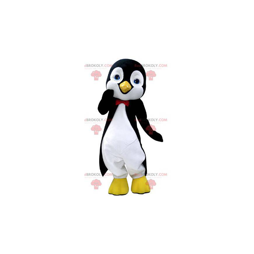 Mascota de pingüino blanco y negro con bonitos ojos azules -