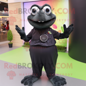 Black Frog mascot costume character dressed with a Maxi Dress and Smartwatches