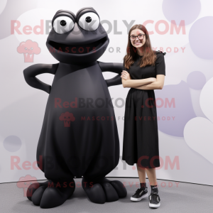 Black Frog mascot costume character dressed with a Maxi Dress and Smartwatches