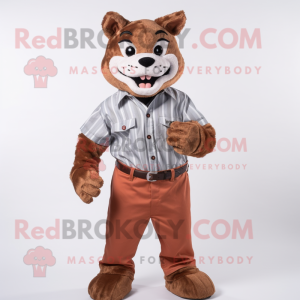 Rust Bobcat mascot costume character dressed with a Poplin Shirt and Bracelets