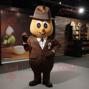 Brown Pear mascot costume character dressed with a Suit and Caps