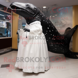 Black Humpback Whale mascot costume character dressed with a Wedding Dress and Foot pads