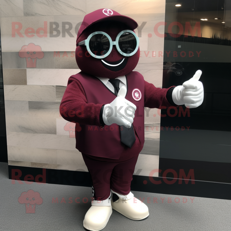 Maroon Wrist Watch mascot costume character dressed with a Suit Jacket and Sunglasses
