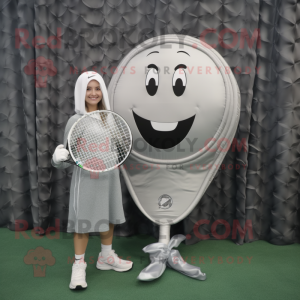 Silver Tennis Racket mascot costume character dressed with a Leggings and Shawl pins