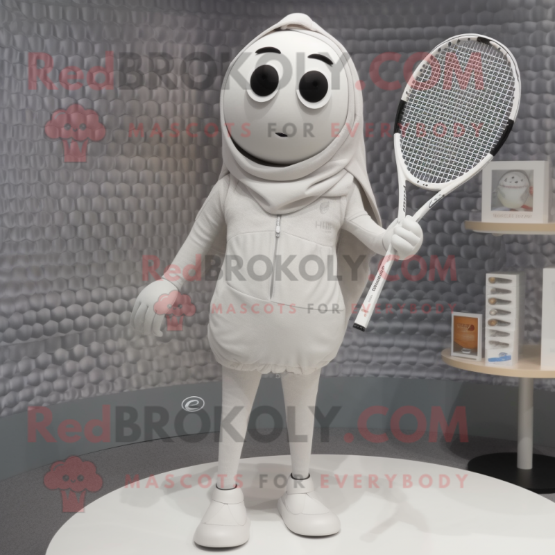 Silver Tennis Racket mascot costume character dressed with a Leggings and Shawl pins Silver Tennis Racket mascot costume character dressed with a Leggings and Shawl pins