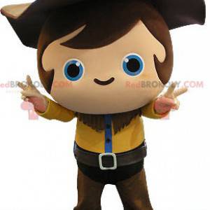 Mascota de niño vaquero con un traje amarillo y marrón -