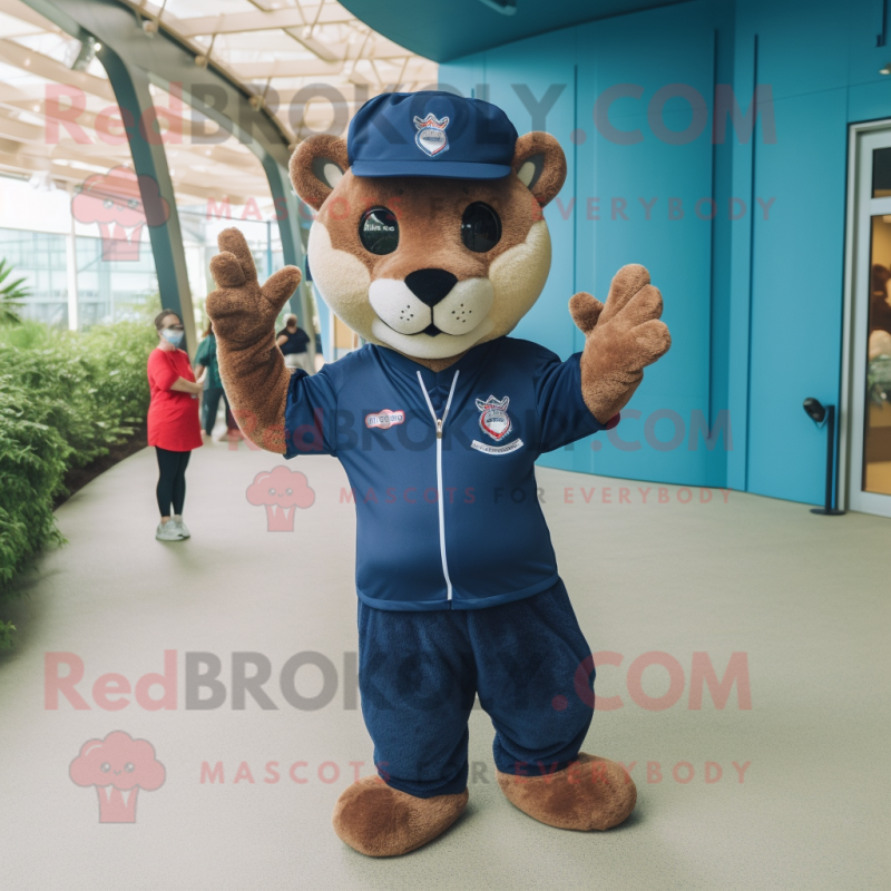 Navy Jaguarundi mascot costume character dressed with a Polo Tee and Mittens Navy Jaguarundi mascot costume character dressed with a Polo Tee and Mittens
