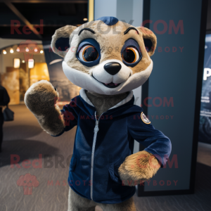 Navy Meerkat mascot costume character dressed with a Graphic Tee and Mittens