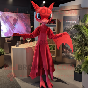 Red Pterodactyl mascot costume character dressed with a Shift Dress and Earrings