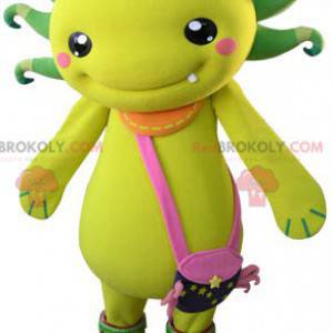 Yellow and green creature mascot with a shoulder bag -