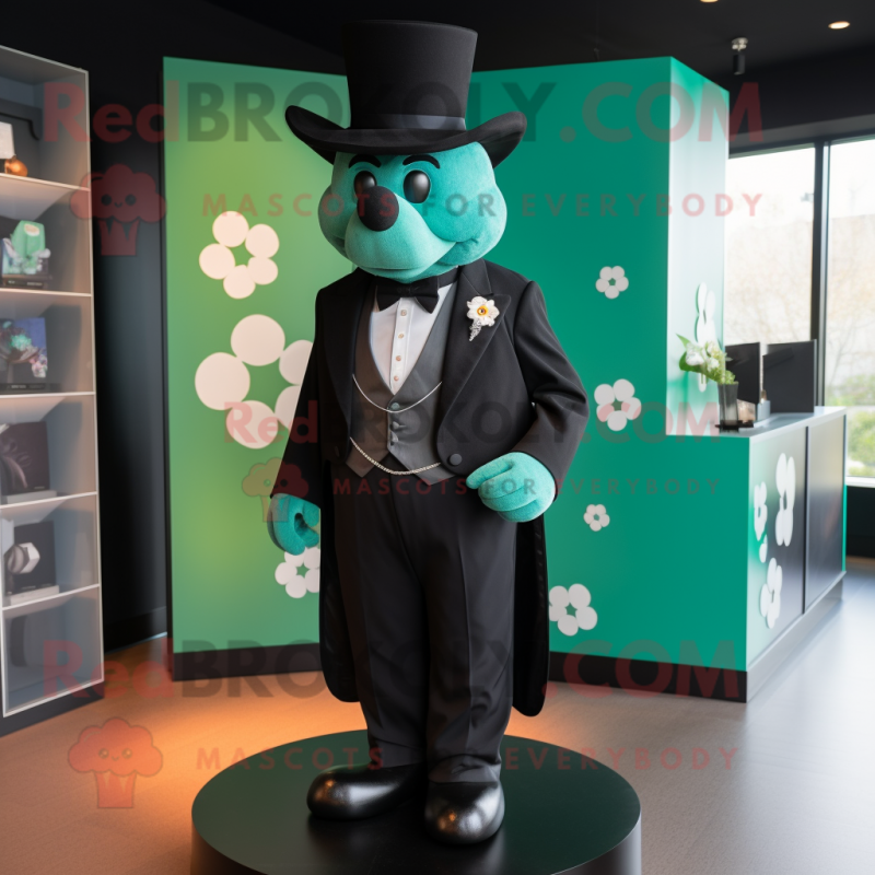Teal Four Leaf Clover mascot costume character dressed with a Tuxedo and Cufflinks Teal Four Leaf Clover mascot costume character dressed with a Tuxedo and Cufflinks