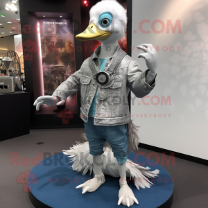 Silver Gosling mascot costume character dressed with a Skinny Jeans and Rings