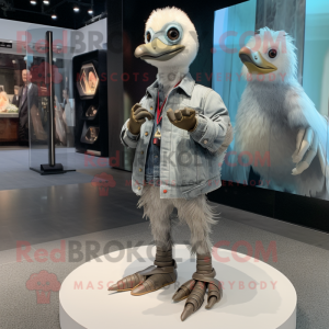 Silver Gosling mascot costume character dressed with a Skinny Jeans and Rings