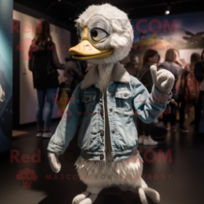 Silver Gosling mascot costume character dressed with a Skinny Jeans and Rings