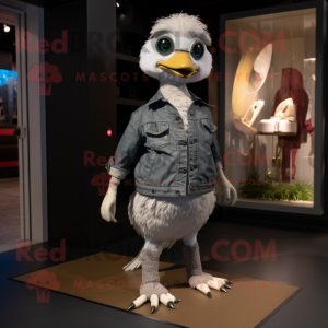 Silver Gosling mascot costume character dressed with a Skinny Jeans and Rings