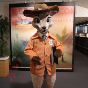 Peach Kangaroo mascot costume character dressed with a Suit Jacket and Hat pins