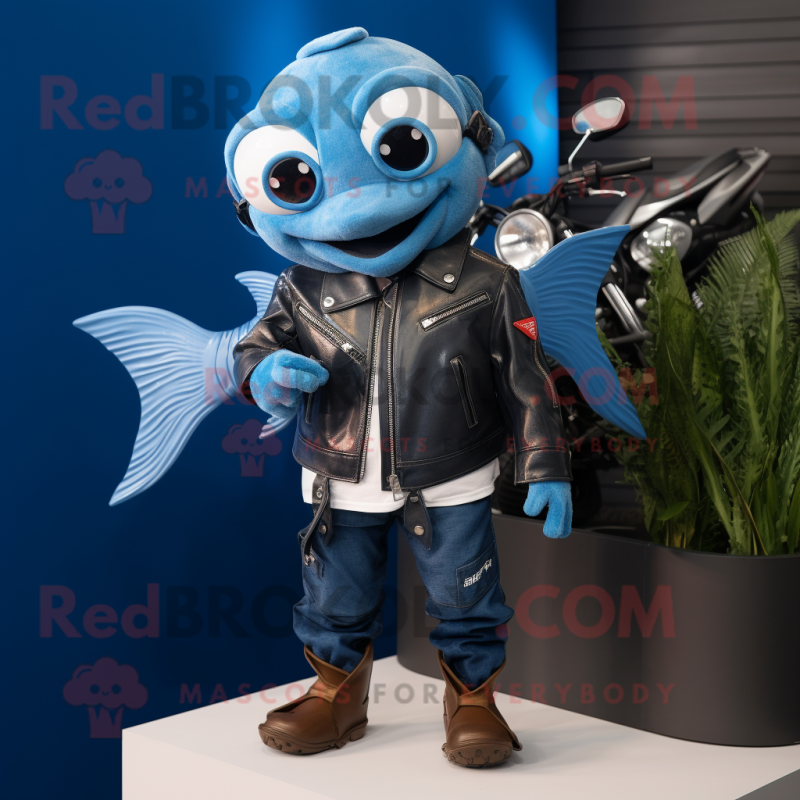 Blue Goldfish mascot costume character dressed with a Biker Jacket and Watches