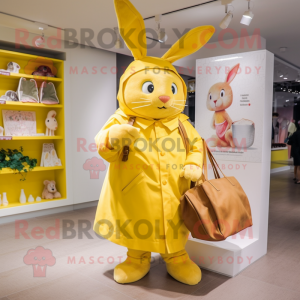 Yellow Wild Rabbit mascot costume character dressed with a Raincoat and Tote bags