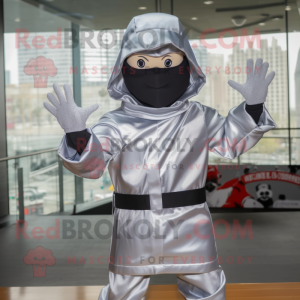 Silver Ninja mascot costume character dressed with a Raincoat and Caps