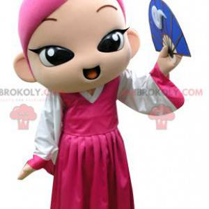 Mascotte de fille aux cheveux roses avec une robe rose -