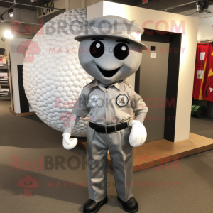 Silver Golf Ball mascot costume character dressed with a Cargo Pants and Tie pins