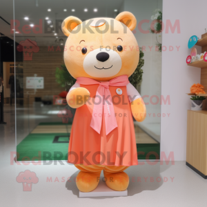 Peach Bear mascot costume character dressed with a Pencil Skirt and Scarves