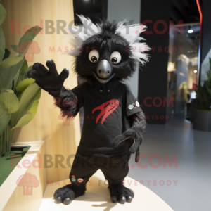 Black Aye-Aye mascot costume character dressed with a Graphic Tee and Gloves
