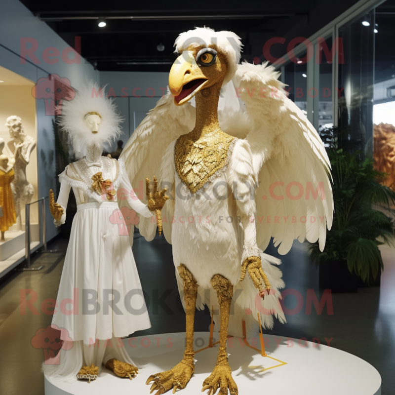 Gold Archeopteryx mascot costume character dressed with a Wedding Dress and Brooches Gold Archeopteryx mascot costume character dressed with a Wedding Dress and Brooches
