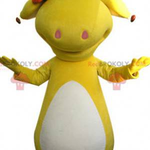 Mascote de dinossauro amarelo e branco. Animal amarelo -