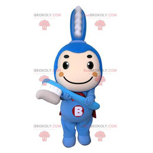 Mascote da escova de dentes azul com uma capa - Redbrokoly.com