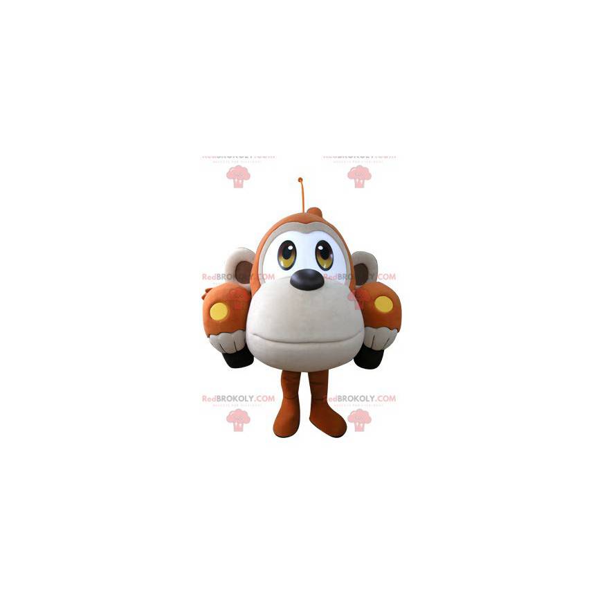 Car mascot shaped like an orange and beige monkey - Car mascot shaped like an orange and beige monkey -