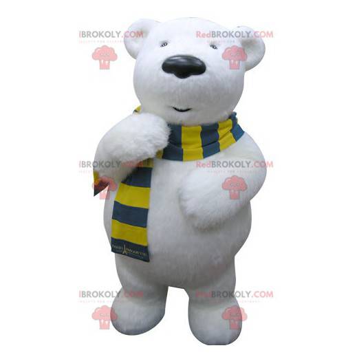 Mascota del oso polar con una bufanda amarilla y azul. -
