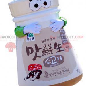 Saleiro de tubo de mascote com chapéu de chef. Mascote