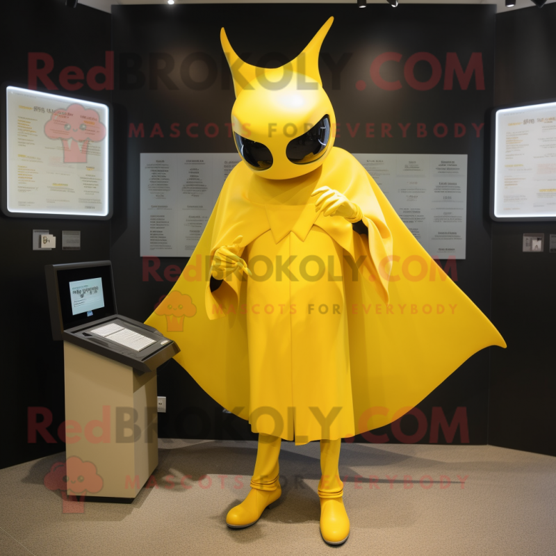 Yellow Manta Ray mascot costume character dressed with a Sheath Dress and Berets