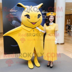 Yellow Manta Ray mascot costume character dressed with a Sheath Dress and Berets